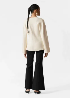 Asymmetrische Strickjacke