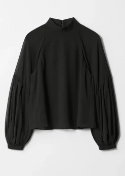 Bluse mit durchscheinenden Puffärmeln