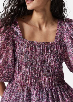 Gesmokte Bluse mit Puffärmeln