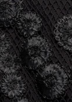 Midirock aus Mesh mit Blumenapplikationen