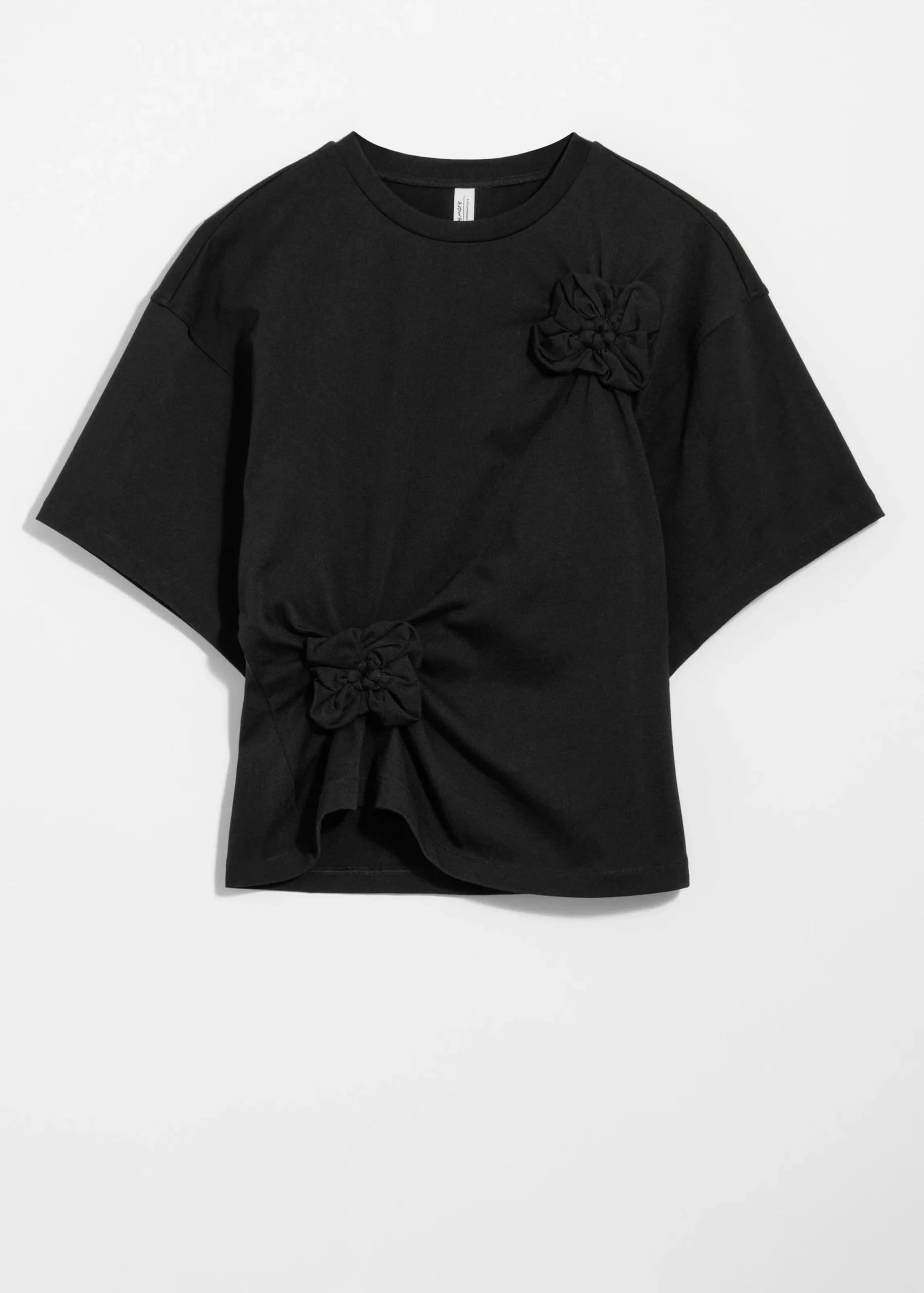 T-Shirt mit Blumenapplikation
